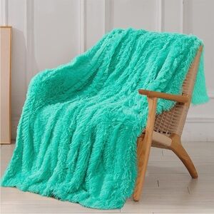 Teal faux fur throw blanket